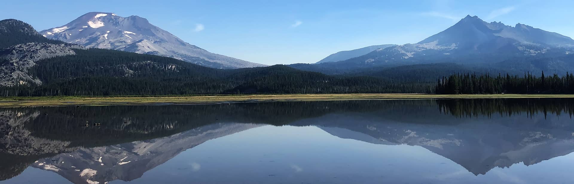 A photo of sparks lake with mountains and reflection in the lake